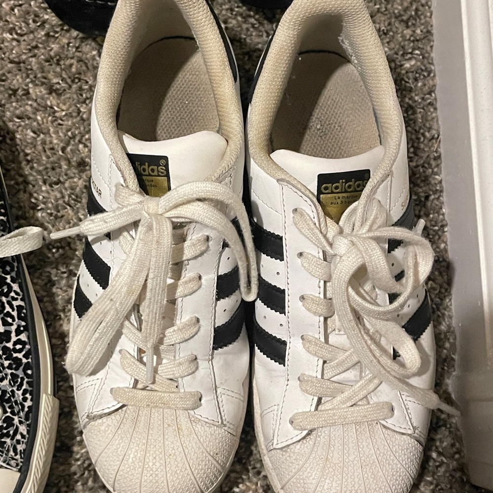 Adidas Women's White Sneakers with Black Stripes